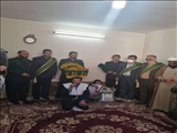 دیدار خادمان رضوی با خانواده شهدا