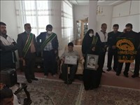 دیدار خادمان رضوی با خانواده شهدا